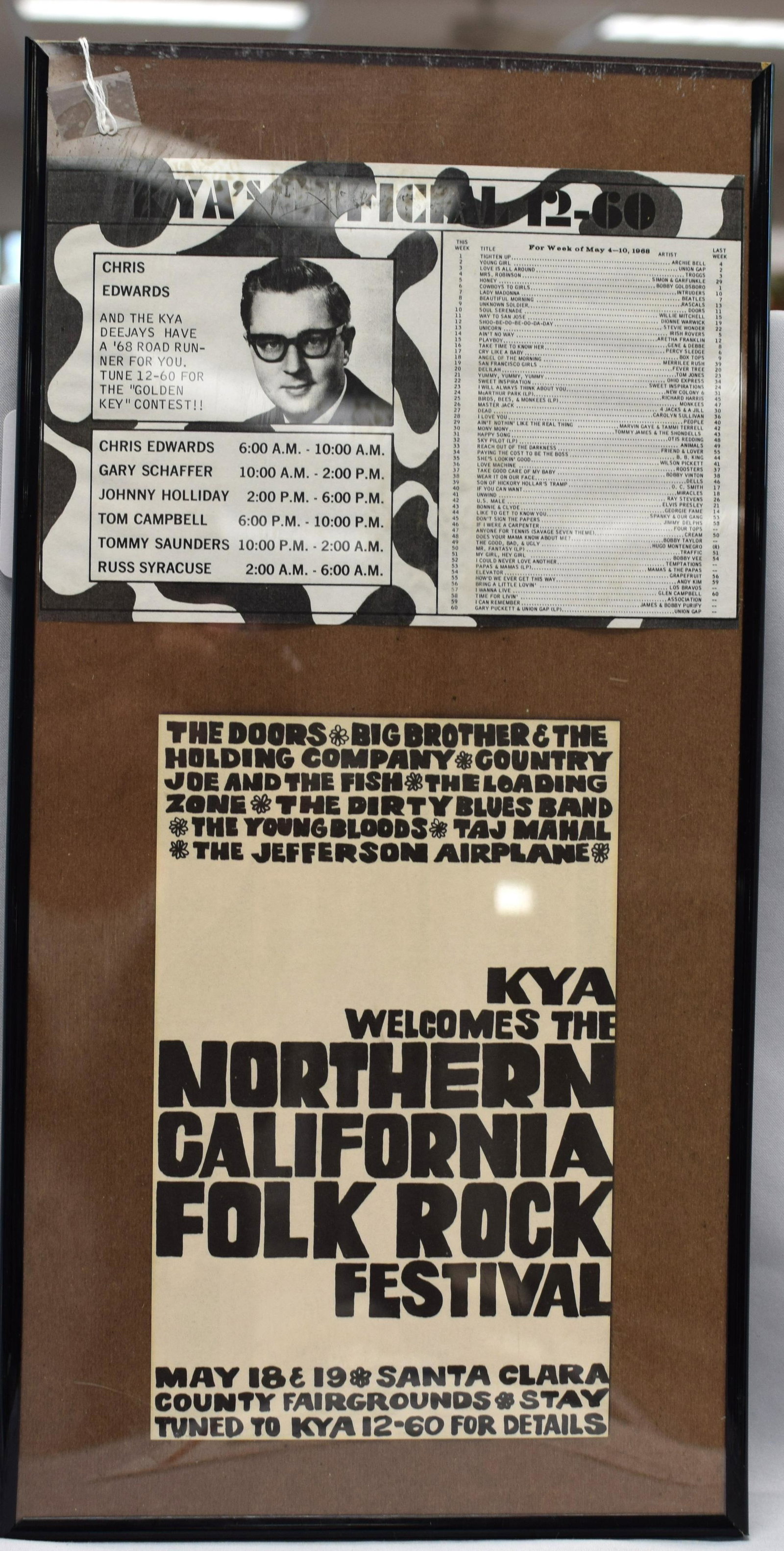 Doors Santa Clara handbill: Framed Handbill from radio station KYAs' Northern California Folk Rock Festival. Framed with a list of the top 60 songs with the Doors, Unknown Soldier, at number 9. 10 x 20 in. Nice item