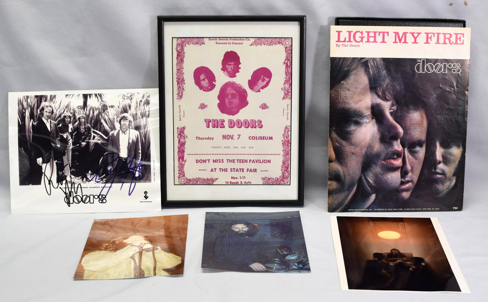 Lot of 6 The Doors related items autographs: Nice lot of Doors memorabilia that includes 4 glossy photos, 1 signed by Ray Manzarek and Robby Krieger, Original Light My Fire sheet music, and a handbill from a show. All in nice condition.Handbill 