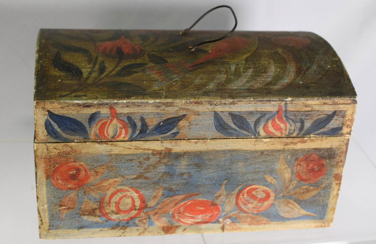 19TH PENNSYLVANIA FOLK ART PAINTED BOX: Ca 19th American pine painted dome top box in a Pennsylvania style decoration. Bird with flower decoration. 10 inches wide. Good condition.