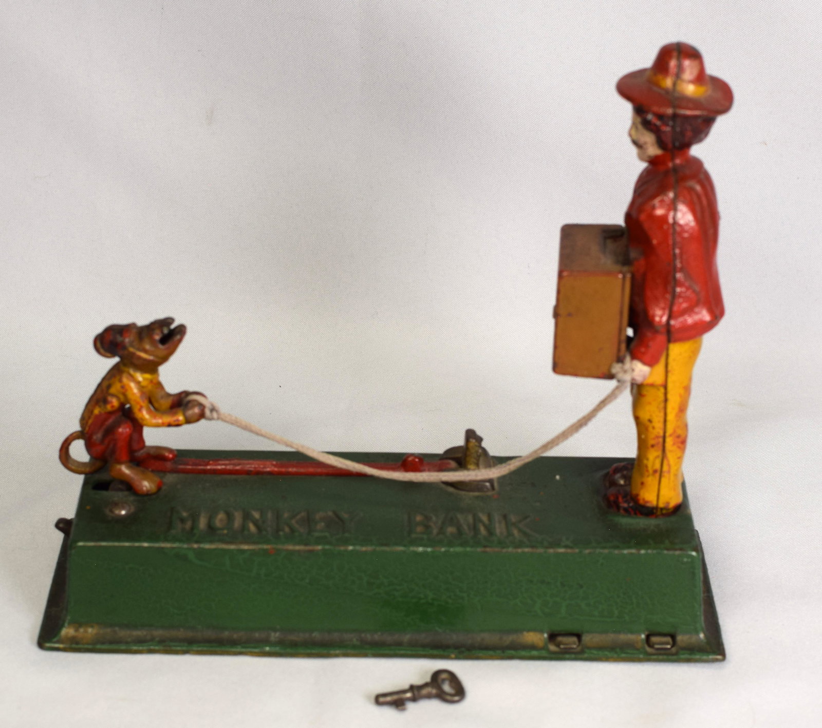 MONKEY BANK MECHANICAL CAST IRON BANK (1 of 5)