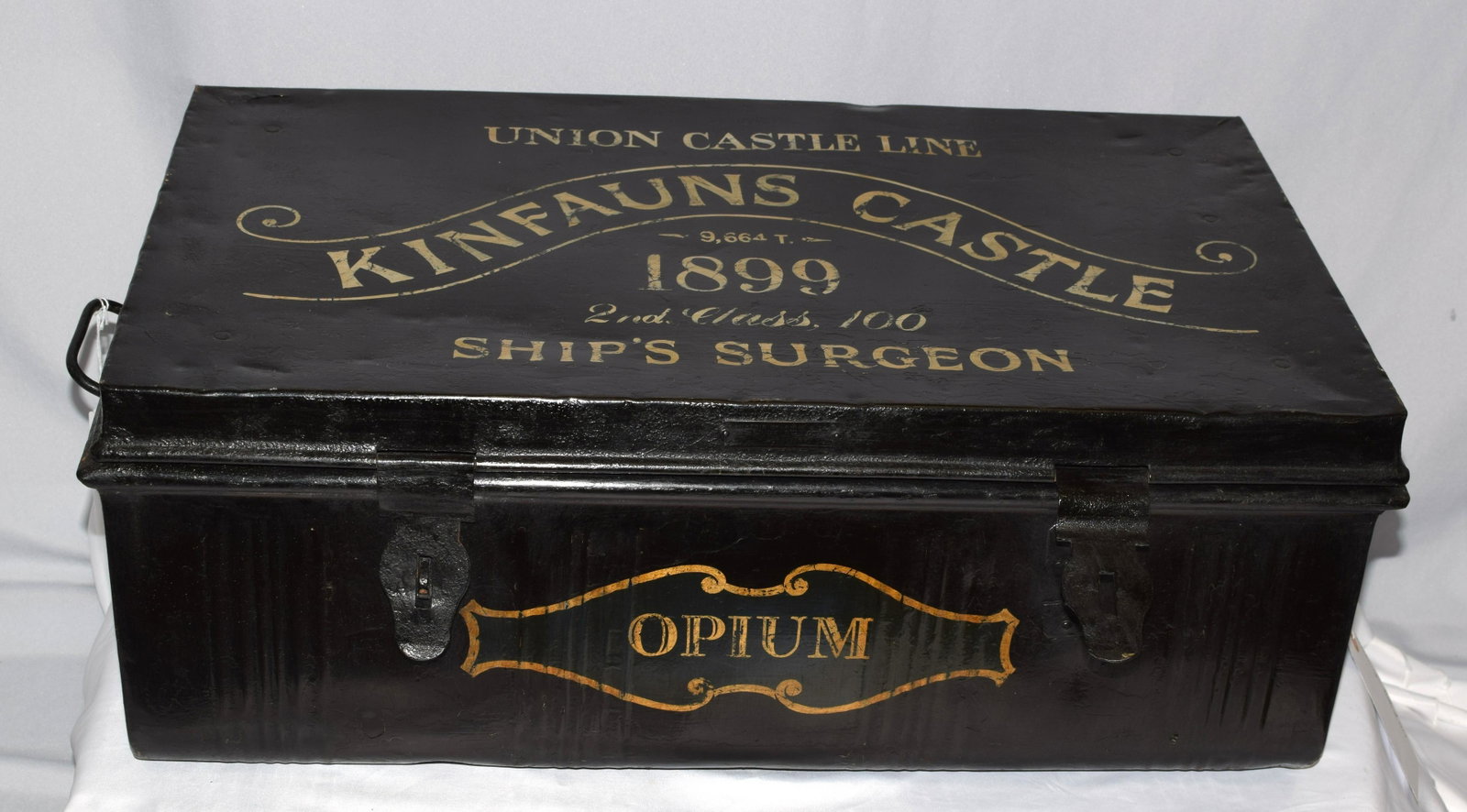 KINFAUNS CASTLE METAL SHIPS OPIUM TRUNK: Marked Union Castle Line Kinfauns Castle built 1899 2nd class Ship's Surgeon Opium. Metal handles. 28 inches wide x 11 inches tall x 16 inches deep. Painted aluminum interior. Weighs21lbs. Good condit
