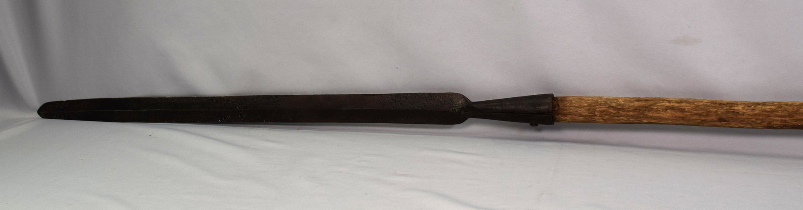 19TH IRON WHALEMAN BOARDING KNIFE: 19th period Whaleman Boarding Knife with vintage hand carved T handle. Total length 55 inches. Newer screw. Boarding knife 28 inches. Handle 4 1/2 inches across. 4 pounds. Wood approx. 1 1/2diameter.