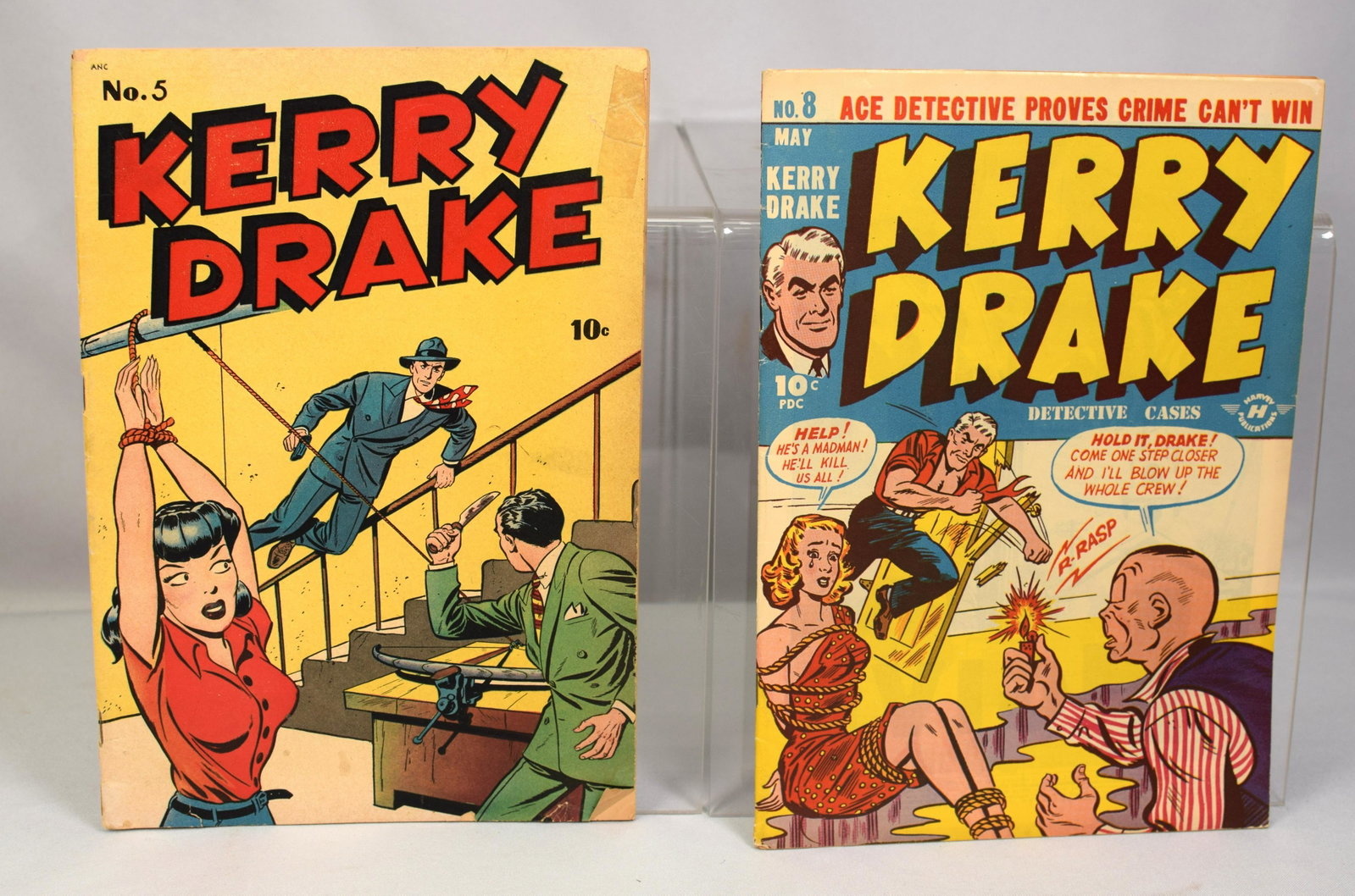 KERRY DRAKE COMIC BOOKS #5, #8: 1944 #5, Cover with stains, old tape repair upper right with tear, Small fold lower right. Back cover with three tape repairs along bottom. Loss on edge back cover. All pages. Interior back page with 