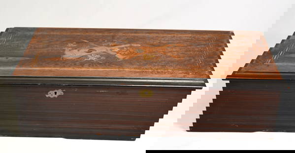 SWISS 10 TUNE MUSIC BOX WITH INLAID CASE: Swiss cylinder 10 tune music box, housed in a rosewood case having an ebonized trim with inlay to the lid. Glass door houses cylinder frame and complete steel comb and is flanked by the windingarm and