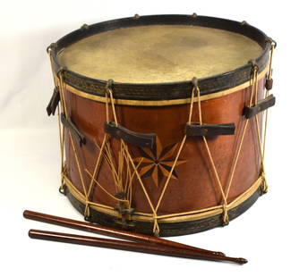 19TH CIVIL WAR ERA DRUM: Ten leather tugs. Painted decorated Wood rims, Ten original metal drum clips which the rope passes. Inlaid vent hole. 16 1/2 inches diameter x 12 1/2 inches tall and 3 pounds shipping. No labelvisible