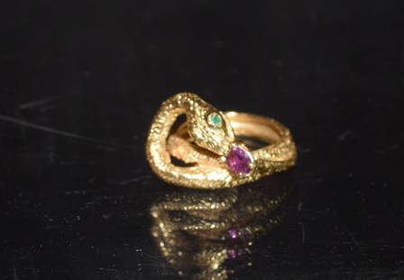 14K GOLD SNAKE RING WITH EMERALD EYES & AMETHSYT: Vintage 14k tested snake eye ring with amethyst. Ring size 6 1/2 and approx. 4.8 DWT. Good condition.