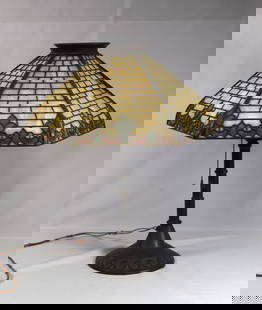 HANDEL LEADED GLASS TABLE LAMP: Handel Leaded Glass Lamp w/ Bronze Base w/ 6 Panel Shade - Approx. 22" h x 19" diam. Signed base and shade. Two panels cracked. Visible in photos. Original wire, but needs to be updated. Pull andsocke