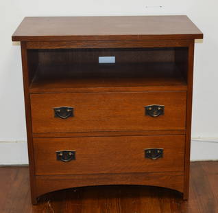 STICKLEY 21TH TWO DRAWER TV STAND: Oak, 29" x 29" x 17", light brown finish, Some water stain top. Signed Stickley stand with two drawers and top shelf for cable box. TV stand. Hammered copper hardware.