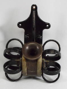 RARE PHELPS DOUBLE CROWN TELEPHONE: Rare Phelps double crown telephone. Iron & Hard rubber or bakelite. Has painted black bracket. 7 inches wide x 5 inches tall and with bracket 9 inches long. Shipping 5 pounds. Seems in good condition.