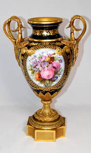 19TH SERVES GILT BRONZE PORCELAIN URN: French Napoleon period 19th gilt ormolu bronze Sevres porcelain urn. Cobalt blue with cameo hand painted floral decoration on front and back. 15 1/2 inches tall x 10 inches handle end to end x 61/2 di