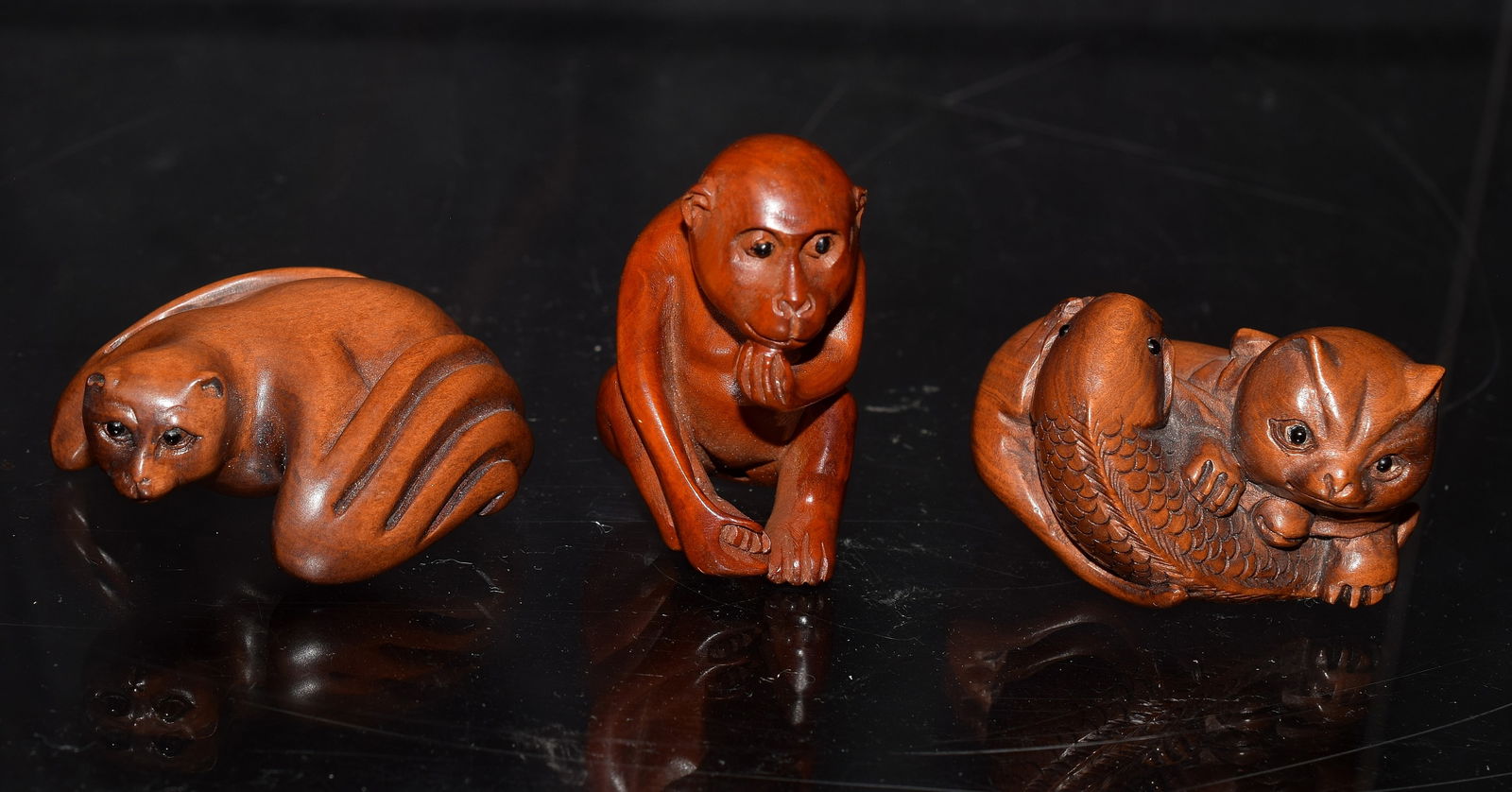 THREE CARVED JAPANESE BOXWOOD NETSUKES (1 of 11)