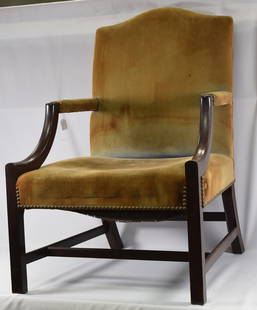 WALLACE NUTTING MAHOGANY LOLLING CHAIR.: Mahogany Chippendale Martha Washington Upholstered Arm chair. Branded Signature.Good condition with no damage and some seat, staining and upholstery wear. Signed bottom of scretcher. Velvet typeuphols