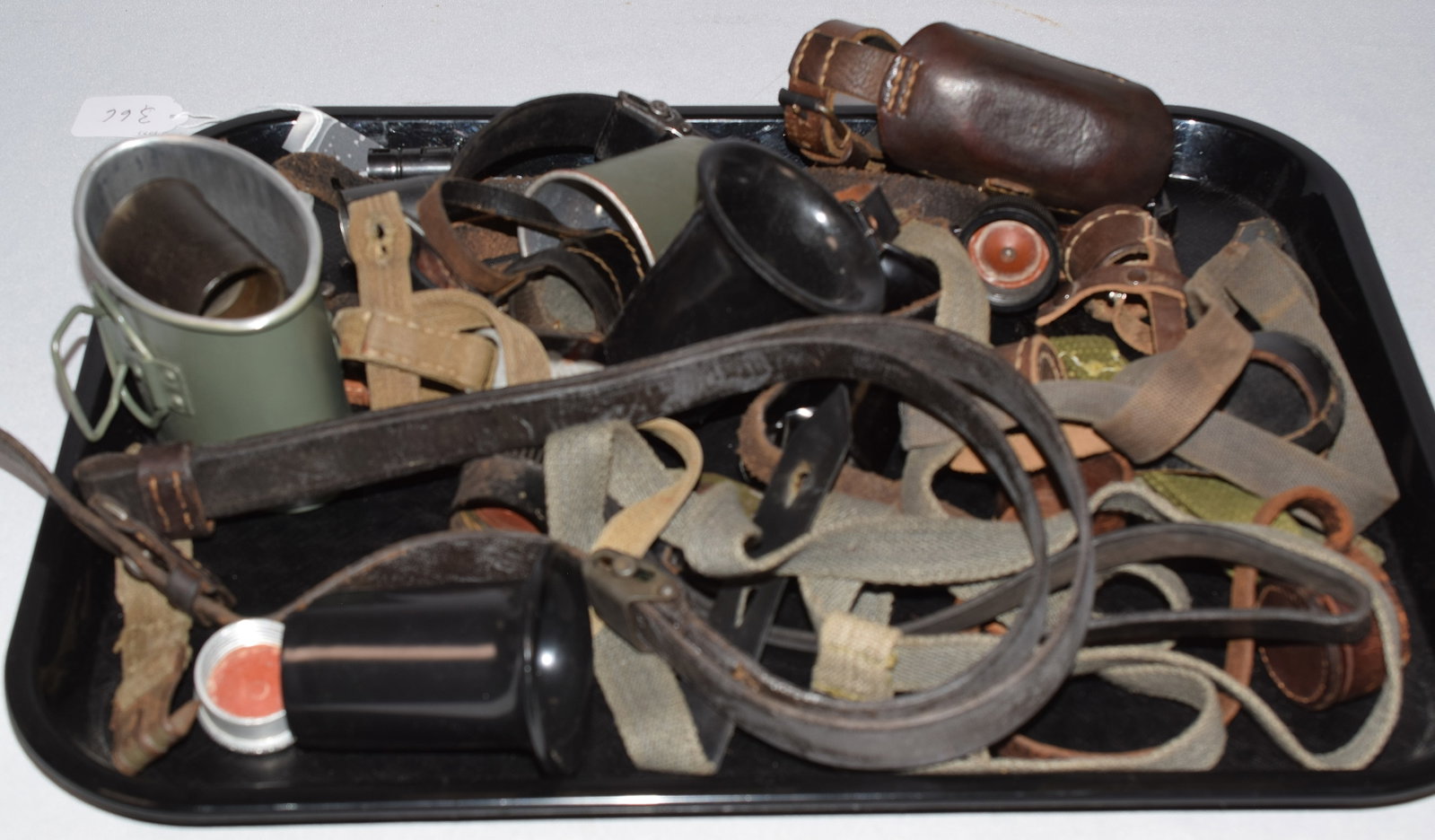 GROUP of GERMAN BELTS, STRAPS, CANTEENS & ETC: Assembled group of canteen parts, straps, belts and etc. Approx. 27 pieces. Estate collection of William Bureau of WWII Third Reich Military. Collection are antique, new, vintage, andreproductions pie