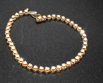 14K YELLOW GOLD DIAMOND TENNIS BRACLET