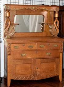 1890's GOLDEN OAK SIDEBOARD WITH FIGURAL SWANS