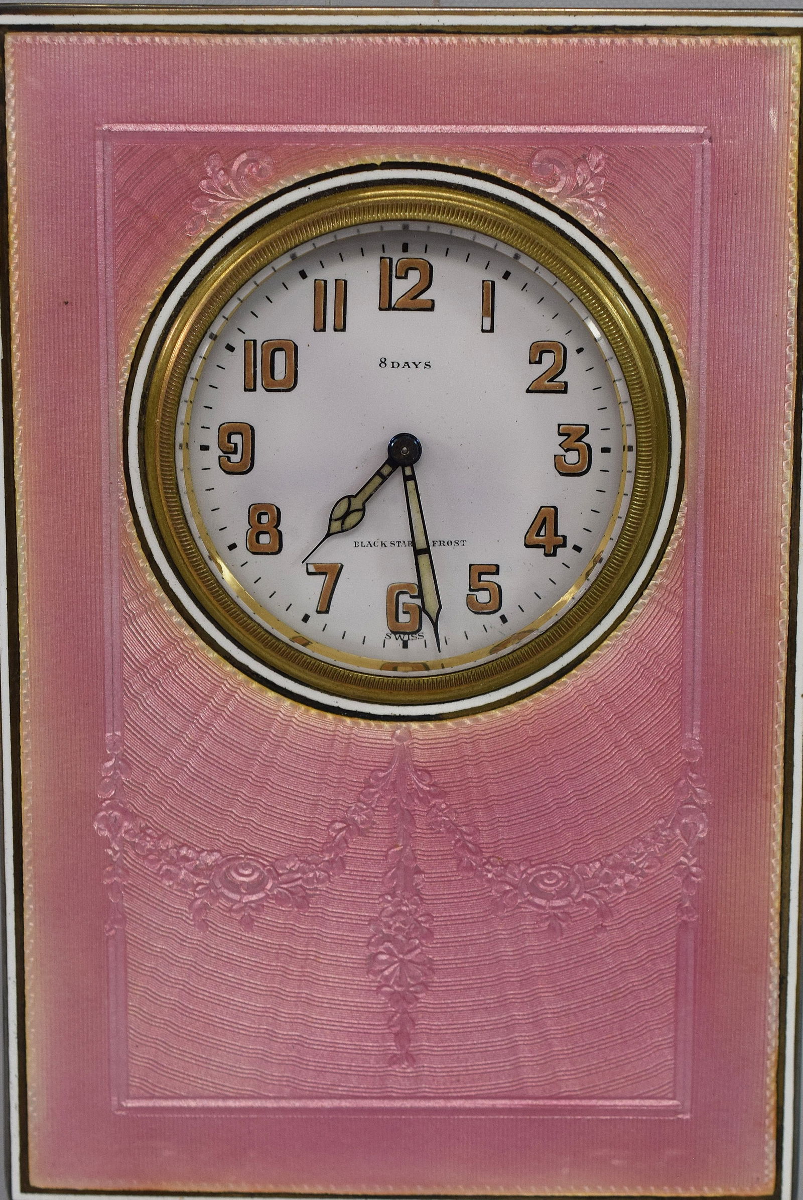 STERLING & GUILLOCHE BLACK,STARR & FROST CLOCK: Cased Sterling & Guilloche 8 day easel desk clock by Black, Starr and Frost. Clack 5 1/4 x 3 1/2 inches. Original case 6 1/2 x 4 1/2 inches wide. Clock is in working condition. Clock and frame 325 gra