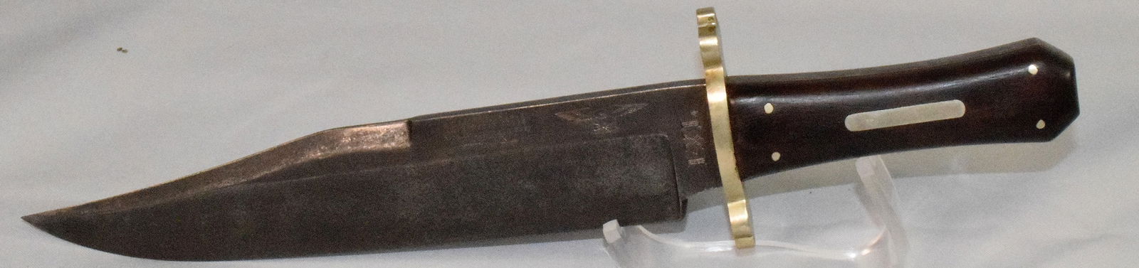 G. WOSTENHOLM & SON IXL BOWIE KNIFE: George Wostenholm & Son Washington Works IXL large bowie knife with coffin handle and a silver hilt. Large bowie with thick stout spine that is stamped on the left side, just below the spine,?G. Woste