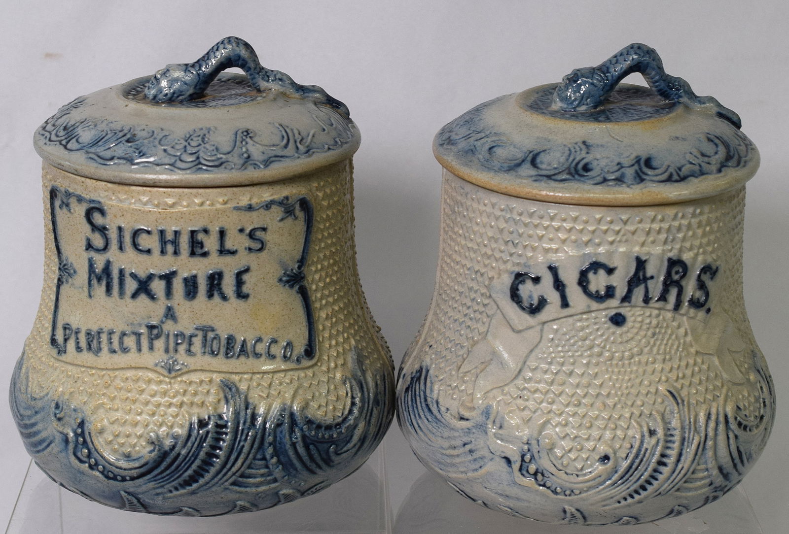 TWO STONEWARE TOBACCO JARS (1 of 9)