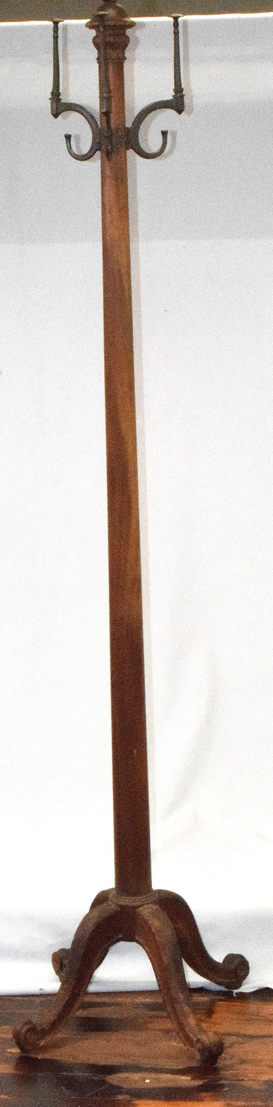 VICTORIAN MAHOGANY COAT STAND: Victorian coat / hat stand in mahogany with 4 carved legs and 3 metal hooks. Good condition, some scratch marks on legs and chip on top. Measures approx. 71 inches tall.