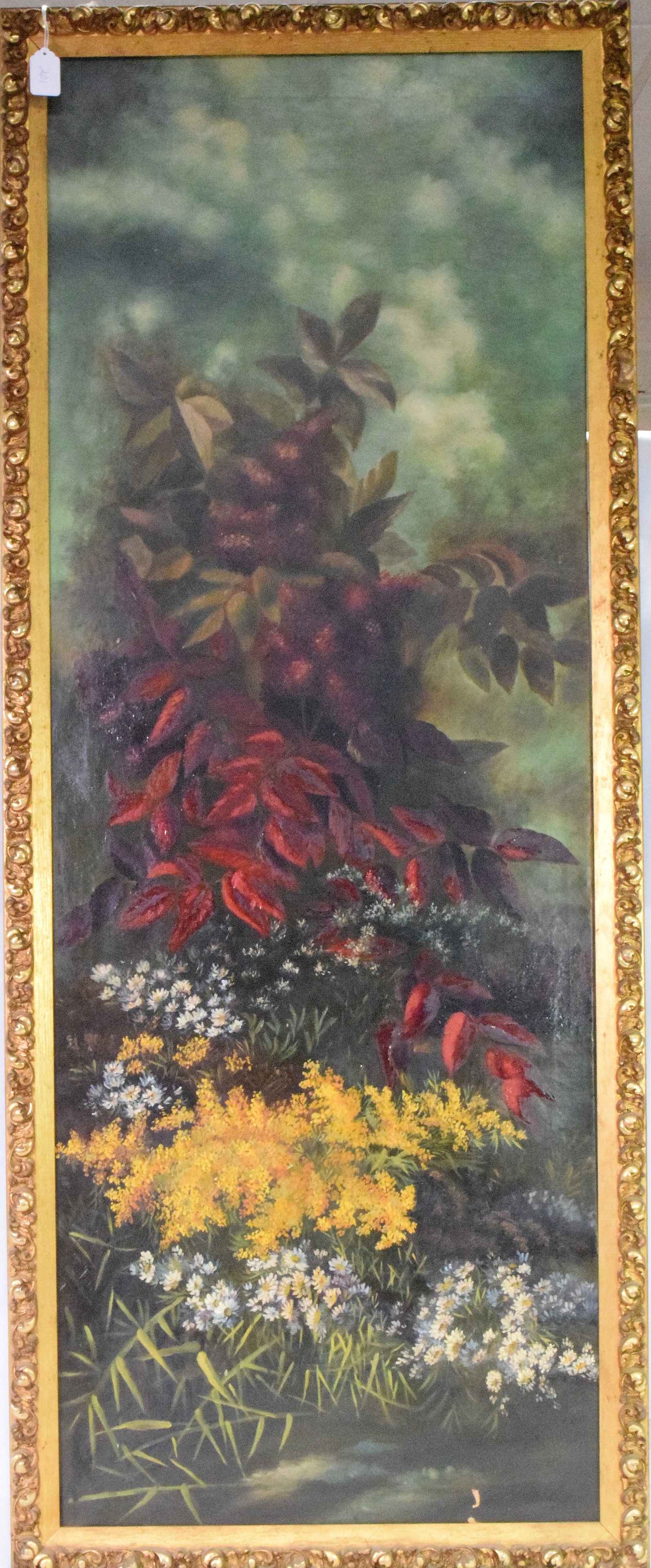 19TH VICTORIAN OIL ON CANVAS PAINTING WILD FLOWERS: Large 19th oil on canvas with tall Lilac blossoms, leaves, Goldenrod, daisies and grass. Image measures 54 inches x 20 inches. Carved gilt frame overall 57 inches x 23 inches. Good condition,needs cle