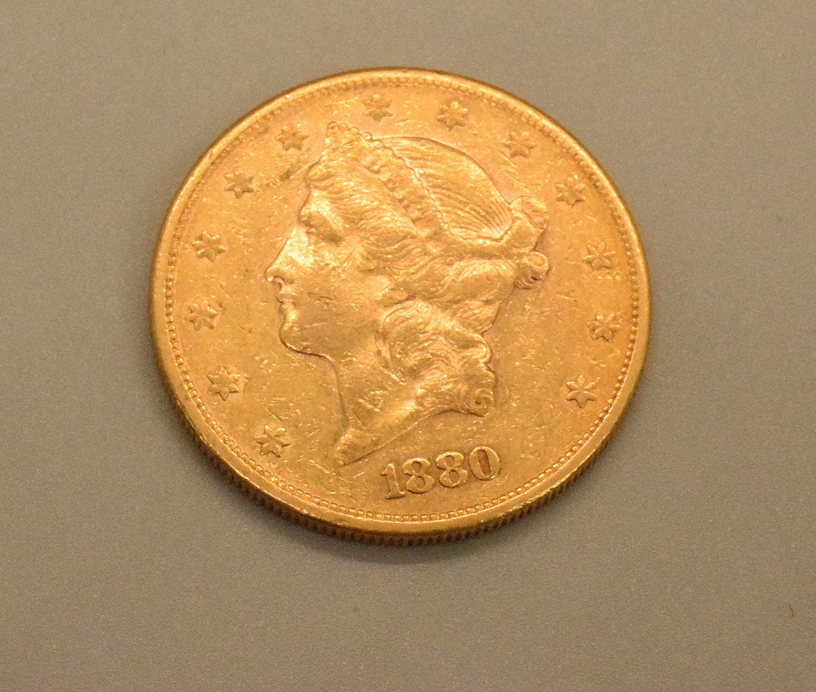 1880-s US GOLD DOUBLE EAGLE TWENTY DOLLAR COIN (1 of 2)
