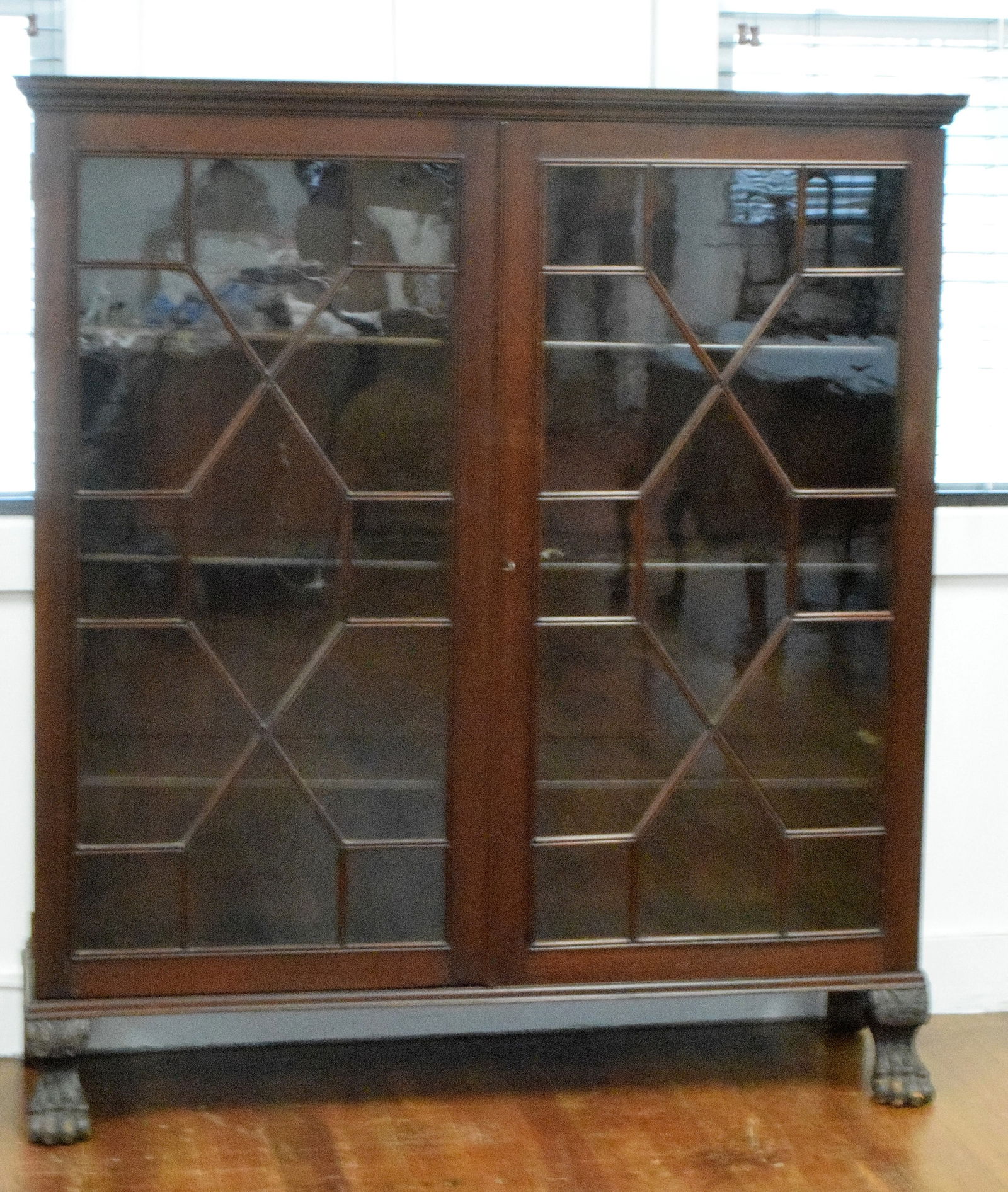 MAHOGANY TWO DOOR BOOKCASE WITH PAW FOOT (1 of 4)
