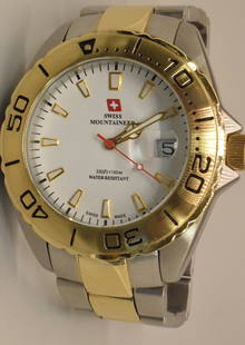 WENGER MOUNTAINEER SWISS WATCH.: Watch with original box, paperwork and is working. Will not guarantee. Good condition
