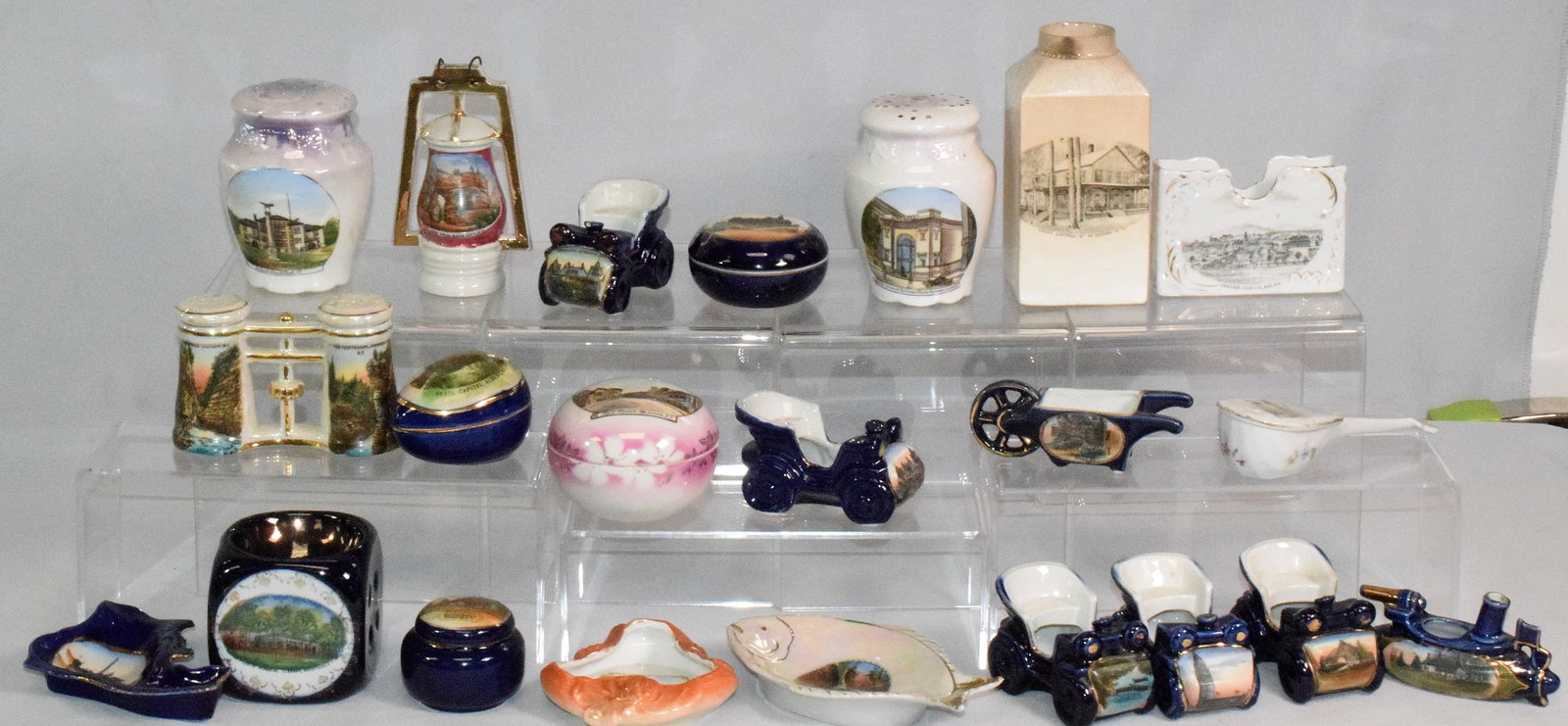22 PIECES NEW YORK COLLECTIBLE SOUVENIR CHINA: From the extensive collection or dealer and collector of Ron Rainka of Warren, Massachusetts. Large lot of collectible Souvenir China. Various forms and colors. Includes various New York cities and to