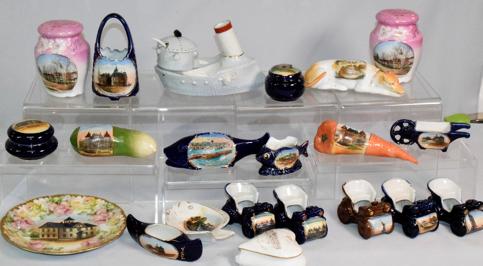 21 PIECES NEW YORK COLLECTIBLE SOUVENIR CHINA: From the extensive collection or dealer and collector of Ron Rainka of Warren, Massachusetts. Large lot of collectible Souvenir China. Various forms and colors. Includes various New York cities and to