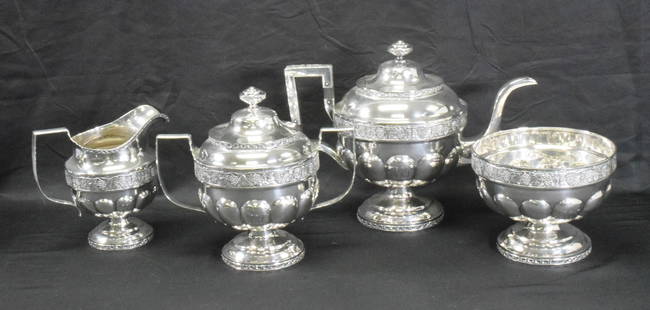 THOMAS RICHARDS COIN SILVER TEA SERVICE: 4 pieces of American coin silver signed T Richards. Thomas Richards New York NY 1816-1825 with this stamp. Consists of teapot, creamer, sugar and waste. Grape and grade vine design. Teapot 8 1/2 inche