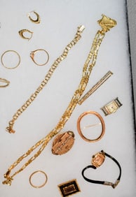 14K GOLD ASSEMBLED GROUPING.