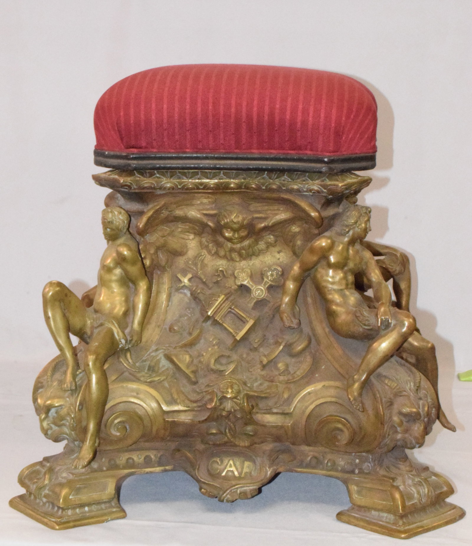 REPURPOSED GAR GILT BRONZE BASE HAS STOOL: Ca 19th. Wonderful detail GAR bronze base of lamp, bottom statue or pedestal? Repurposed has stool with paino stool seat. Full nude male figural corners. Damage to one foot. Visible in photo. 20inches