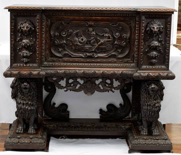 19TH RENAISSANCE REVIVAL CARVED CABINET ON STAND: Late19th Itaian Florentine baroque or renaissance revival carved walnut cabinet on stand.. Rectangle case with egg and dated molding. Single carved center drop down door with chariot. Flank by towlion