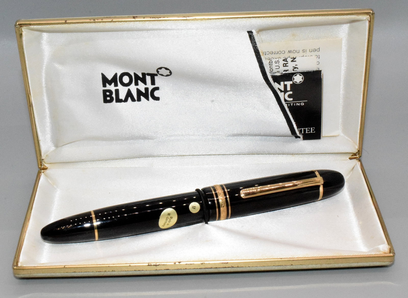MONT BLANC MEISTERSTUCK 149 FOUNTAIN PEN: 14k nib with original paperwork. Mont blanc Meisterstuck black and gold trim fountain pen # 149. Elegant, classic look and design. Includes original box. Measures approximately 5 3/4 inlong. Box 6 1/2