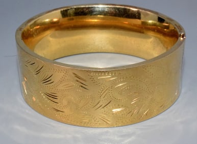 14K YELLOW GOLD CUFF BRACELET.