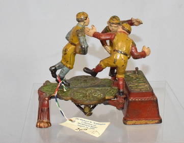 CAST IRON CALAMITY FOOTBALL MECHANICAL BANK (1 of 10)