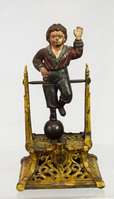 BOY ON TRAPEZE MECHANICAL BANK