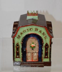J & E STEVENS CAST IRON MECHANICAL BANK