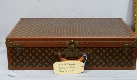 LOUIS VUITTRON SUITCASE WITH WEDDING DRESS