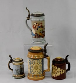 GROUPING OF 4  METTLACH POTTERY STEINS