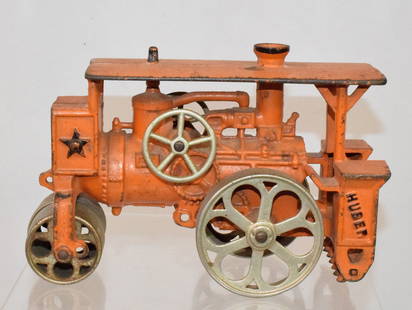 HUBLEY HUBER STEAM ROAD ROLLER CAST IRON TOY: Antique Huber road rollerbHubley cast iron toy. Circa 1932. 5 inches tall x 7 3/4 inches long x 3 3/38 wide. Original orange with nickel wheels, roller and fly wheel. Signed "Huber" and embossedstars.