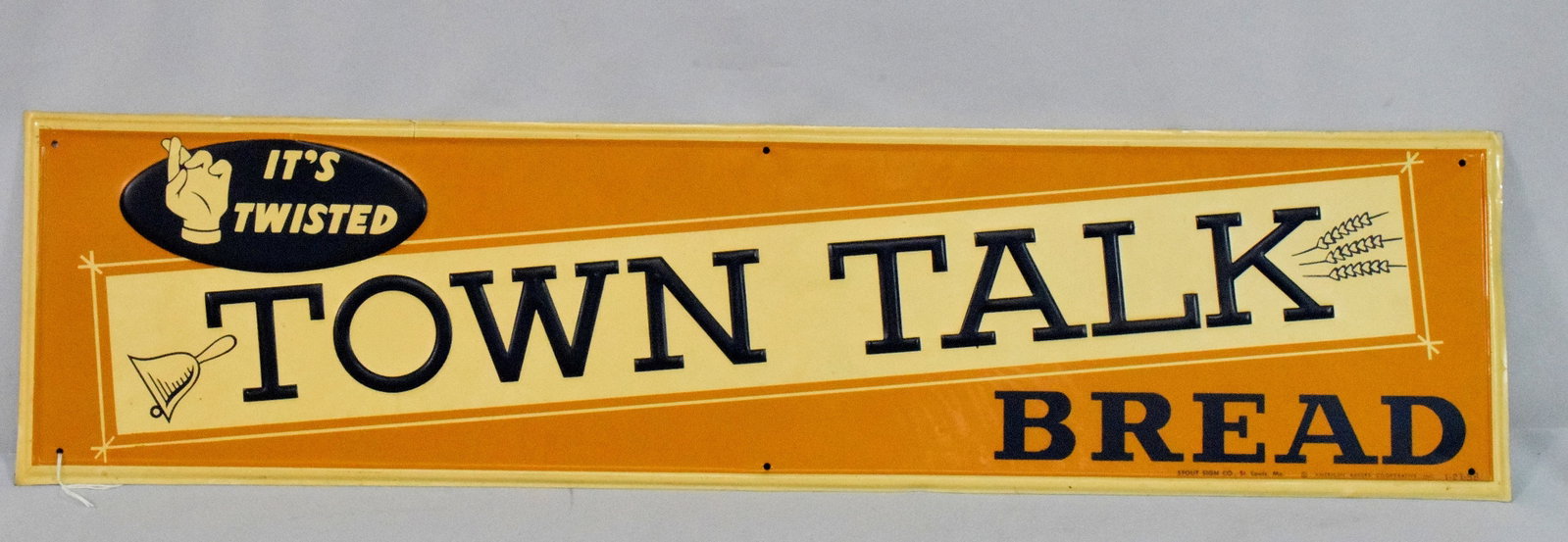 TOWN TALK METAL EMBOSSED SIGN: Single sided. 27 3/4 inches x 7 inches. Dated 1958. Good condition. Shipping weight 2 pounds.