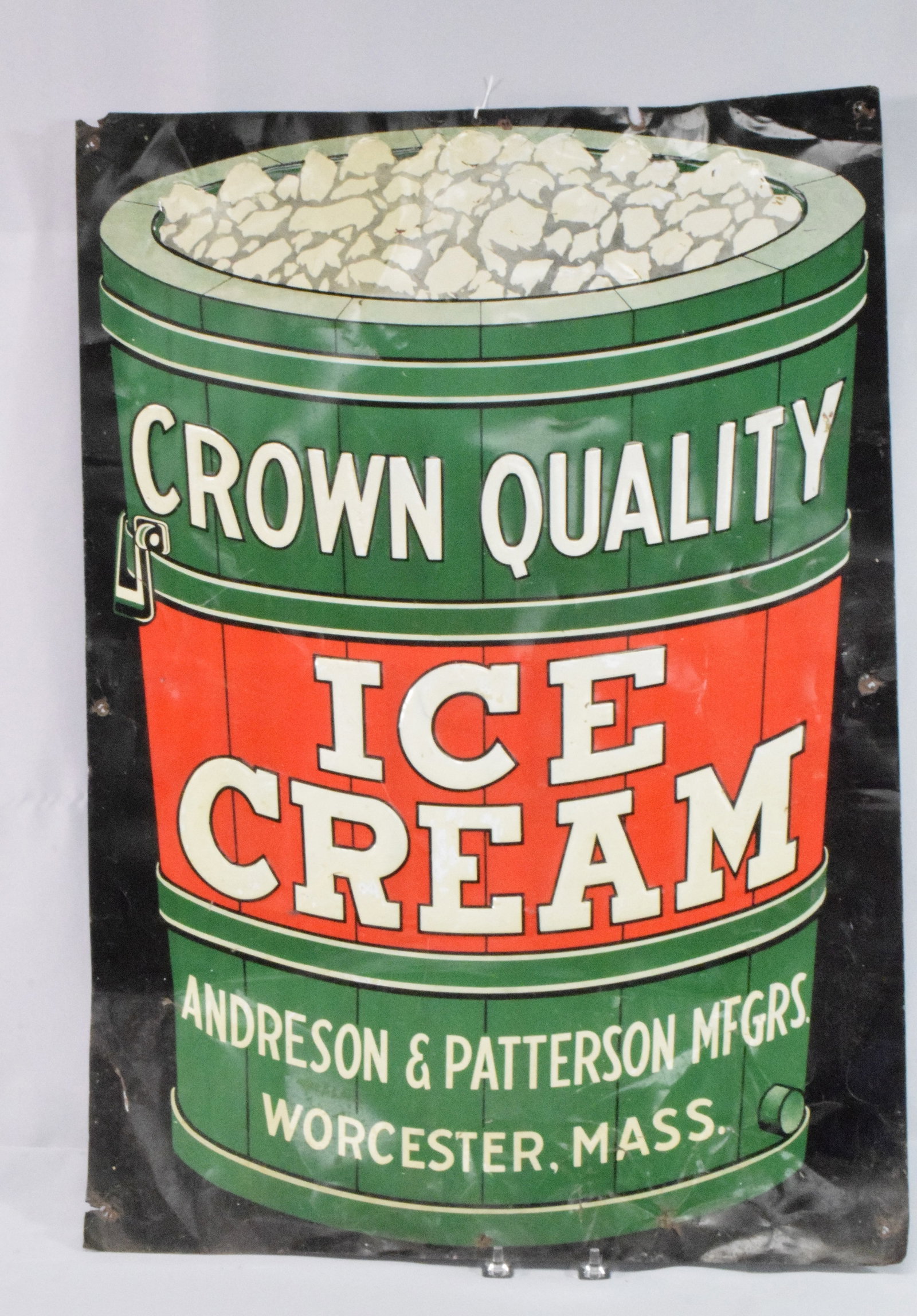 CROWN QUALITY ICE CREAM SIGN: Tin Ice Cream sign. 7 1/2 x 19 1/2 inches. Some wear. Shipping weight 2 pounds.