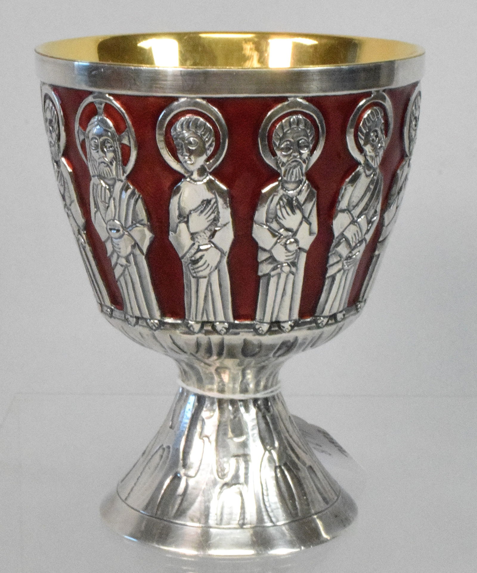 LAST SUPPER 12 APOSTLES LITUART ENAMEL CHALICE: Enamel chalice with the twelve apostles. 12 apostles with red ruby enamel. Weighted base with the mark of Spain (star) Lituart. With memorial of "In the memory of Adam Polak given by his family. 6 inc