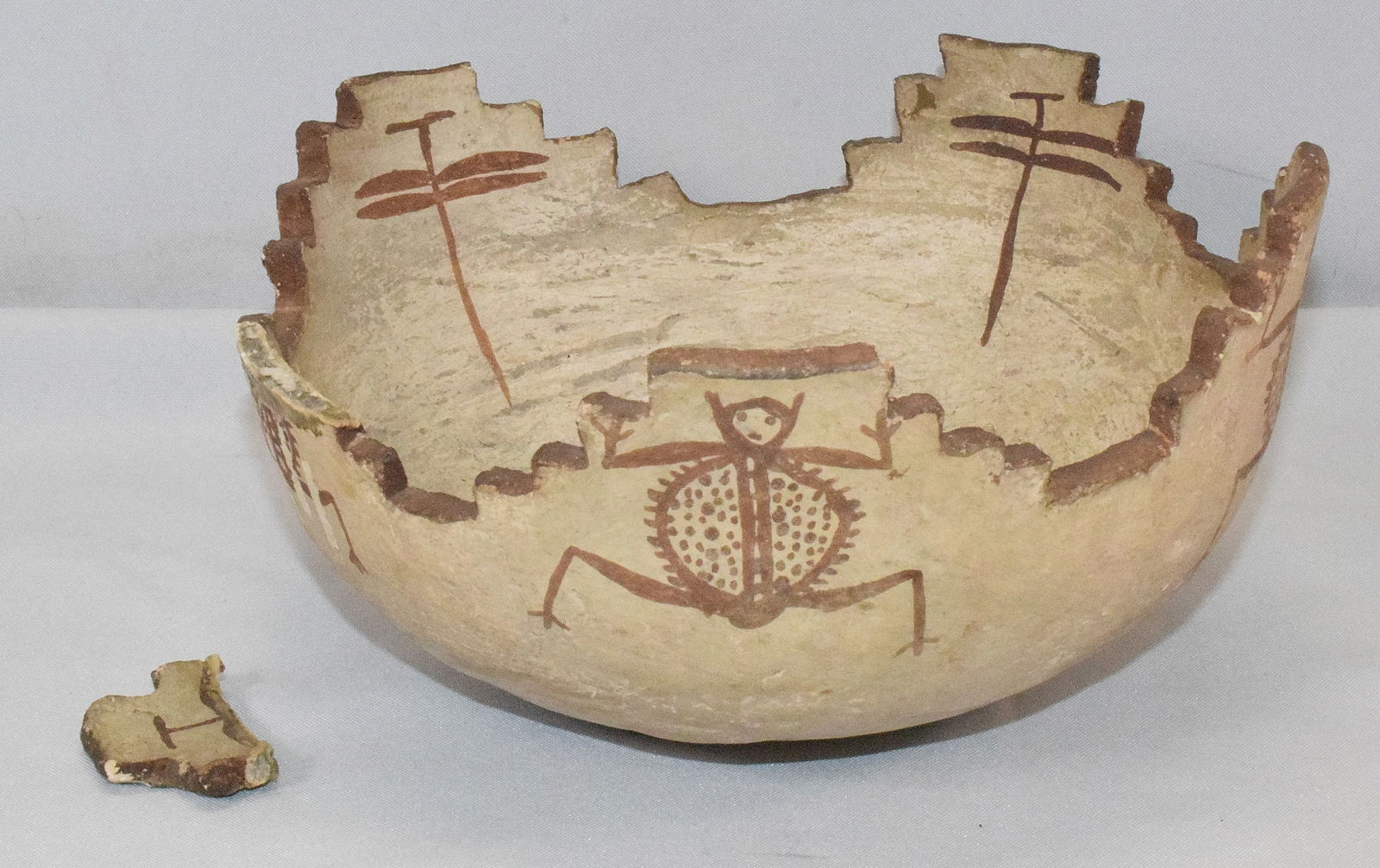 ZUNI TERRACED BOWL WITH FROGS & DRAGONFLIES: Native American Zuni Terraced Bowl, with Frogs and Dragonflies. Late 19th century. interior painted with a frog and dragonflies; exterior detailed with additional frogs. height 4-1/4 inches x diameter