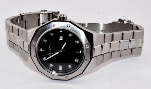 BULOVA DIAMOND & STAINLESS STEEL MENS WATCH: Quartz movement with new battery. Bulova classic diamond (8) and stainless steel men's watch with black face and Quartz movement, water resistant. Good condition, some scratches on wrist band. Face me
