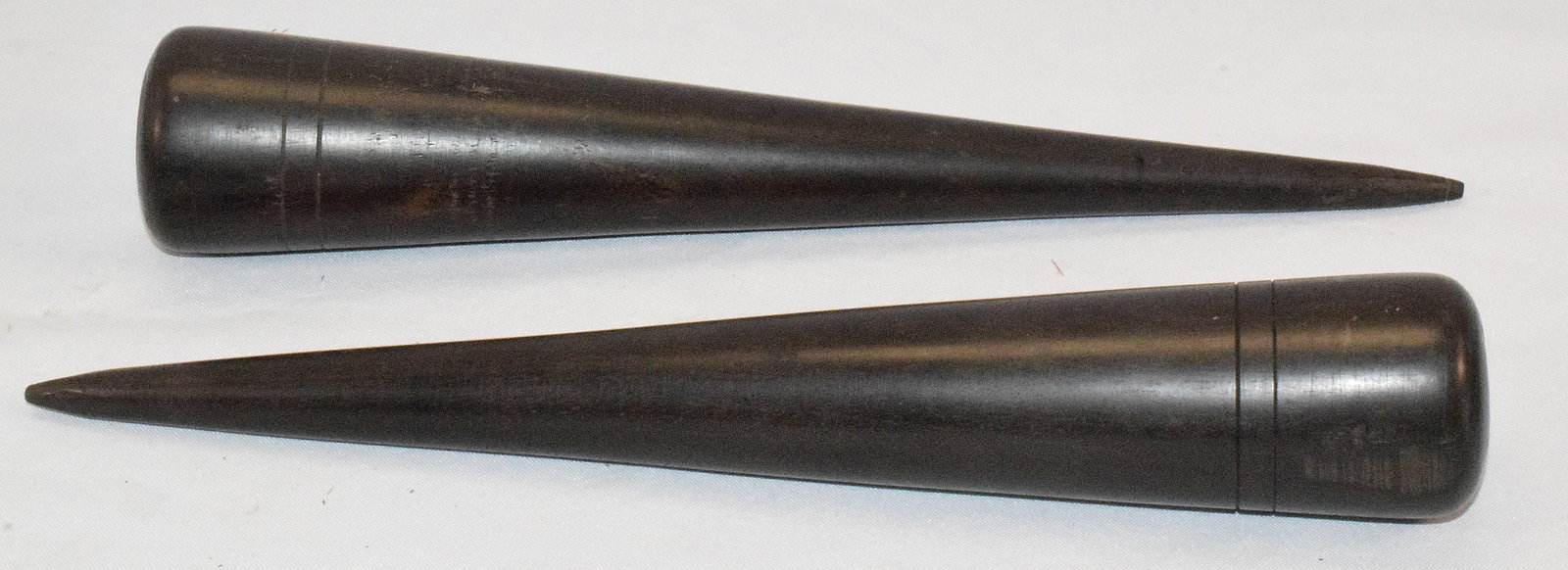 (2) 19TH TEAK WOOD SAIL MAKING NAUTCAL FIDS: Turned teak wood sail maker fids. Both approx. 12 inches long. One in good condition. The other has a split on top. Shipping weight approx. 3 pounds.