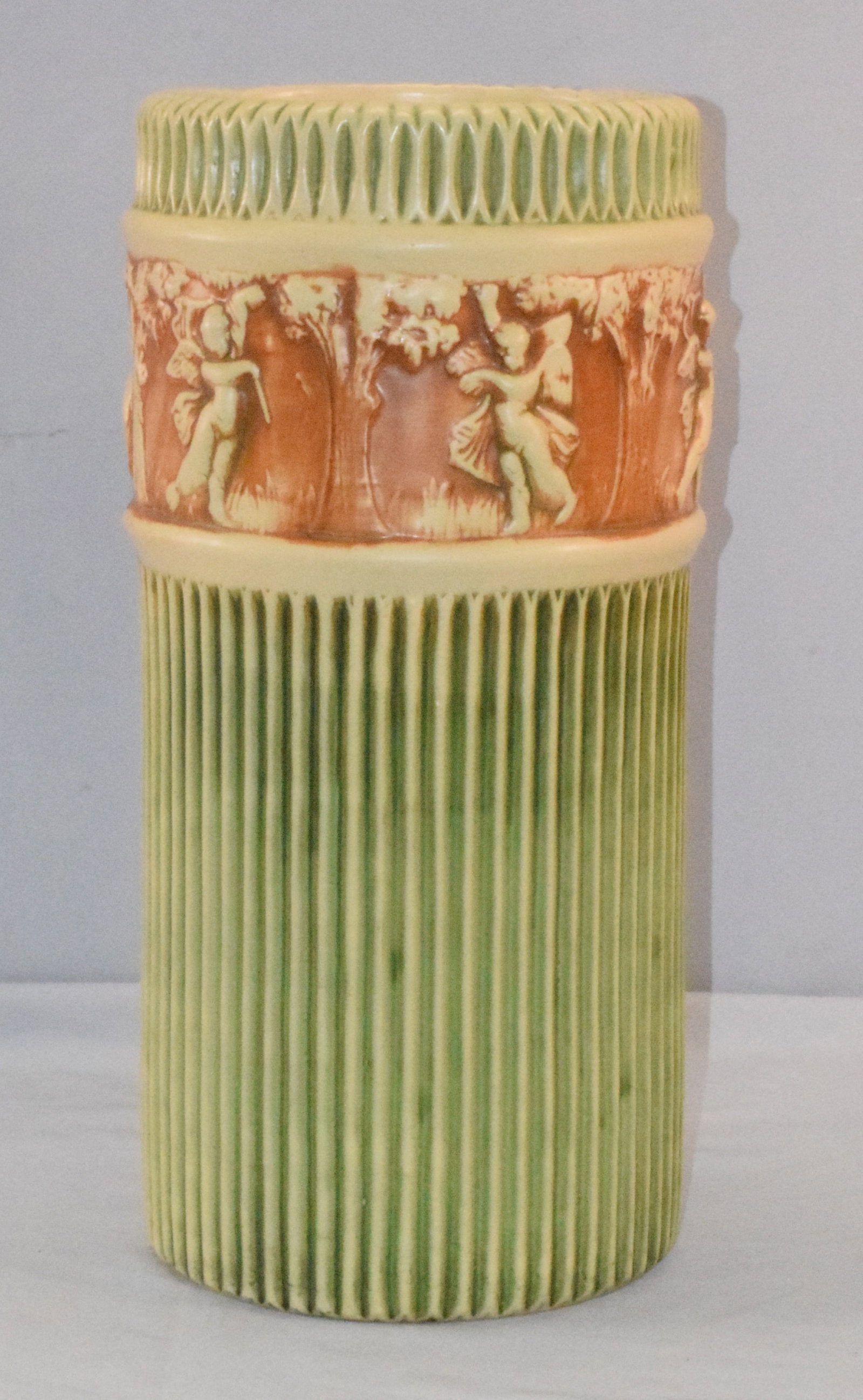 ROSEVILLE DONATELLO UMBRELLA STAND: Roseville Pottery "Donatello" Umbrella Stand. Early 20th century. Unmarked. Umbrella stand 21 inches. Good condition.