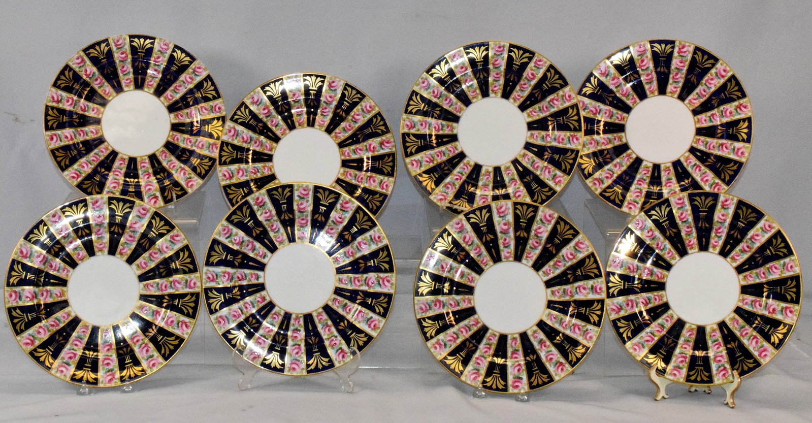 8 TIFFANY & CO. OF NEW YORK DERBY IMARI PLATES: Crown Staffordshire retailer Tiffany & Co. New York Derby Old Imari Patterned Plates, 10 inches across. Used condition, Wear on paint and wear to gold on rims of 4-8 plates. The pattern on the plates 