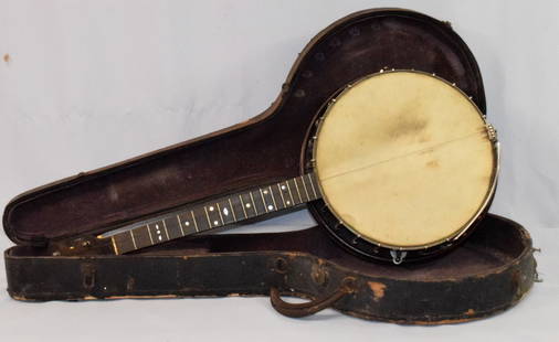WEYMANN BANJO: Signed Weymann and Son old banjo. Numbered 17347. Marked on back of neck. 30 inches long. 4 string. Missing a mother of pearl piece on bottom neck. Visable in photo. Just one string. Banjo needs tobe